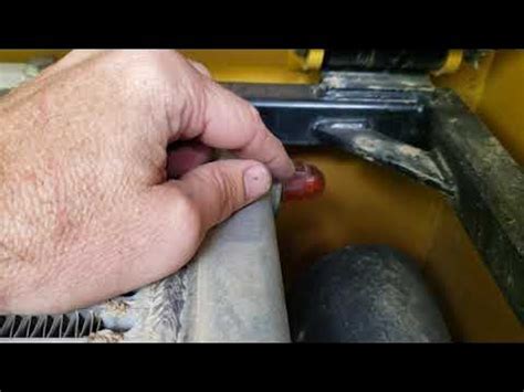 caterpillar skid steer coolant drain|skid steer coolant drain instructions.